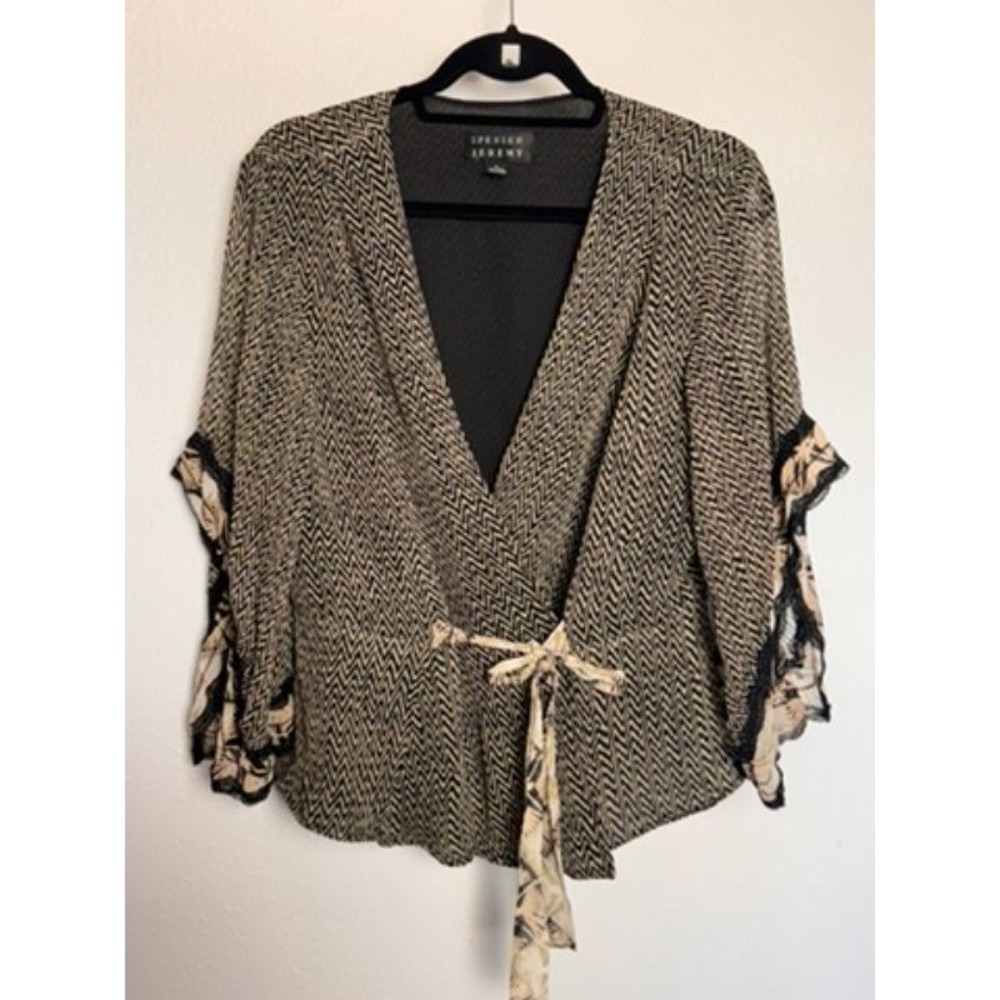 chic Black and Cream Wrap Blouse with Floral Tie Detail